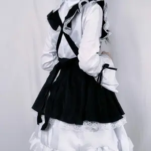Elegant Black and White Maid Cosplay Dress - Kawaii Lolita Style with Apron and Bow Accents 4
